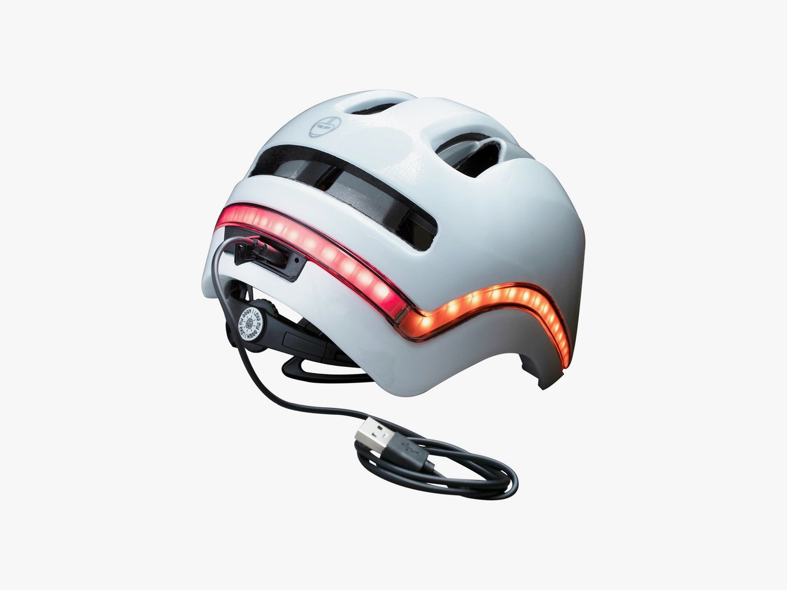 Nutcase Vio helmet with cable connected and lights on