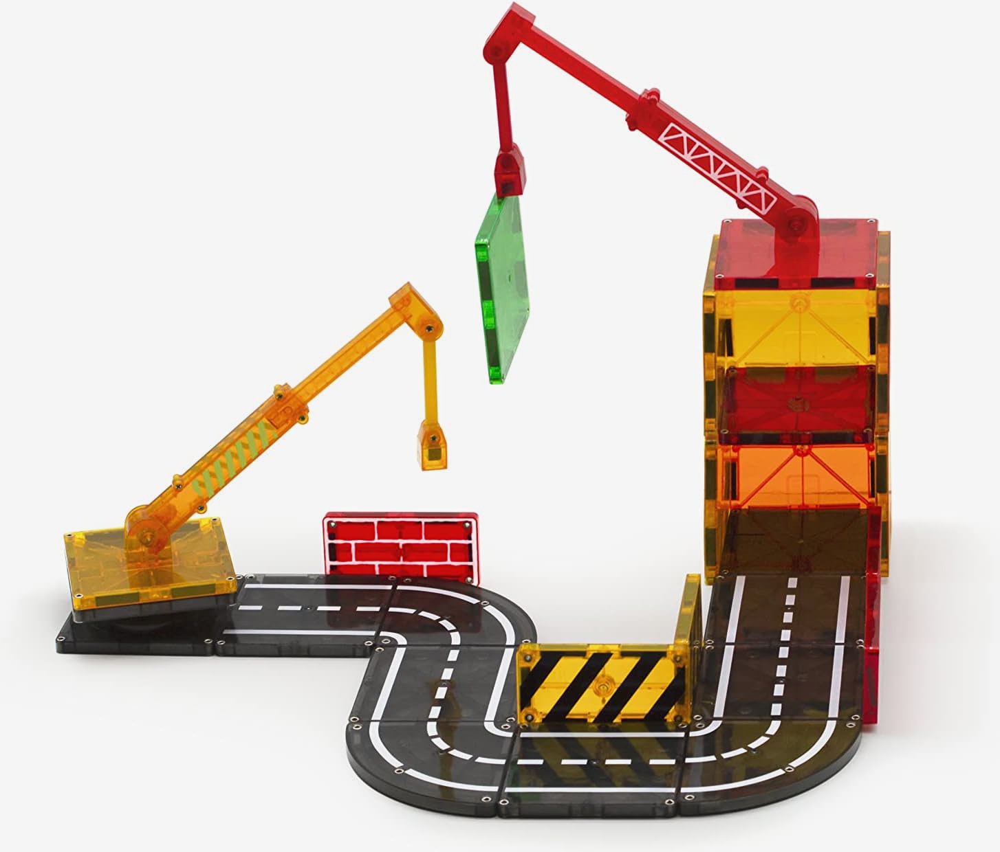 MagnaTiles toy constructed to look like two cranes moving equipment